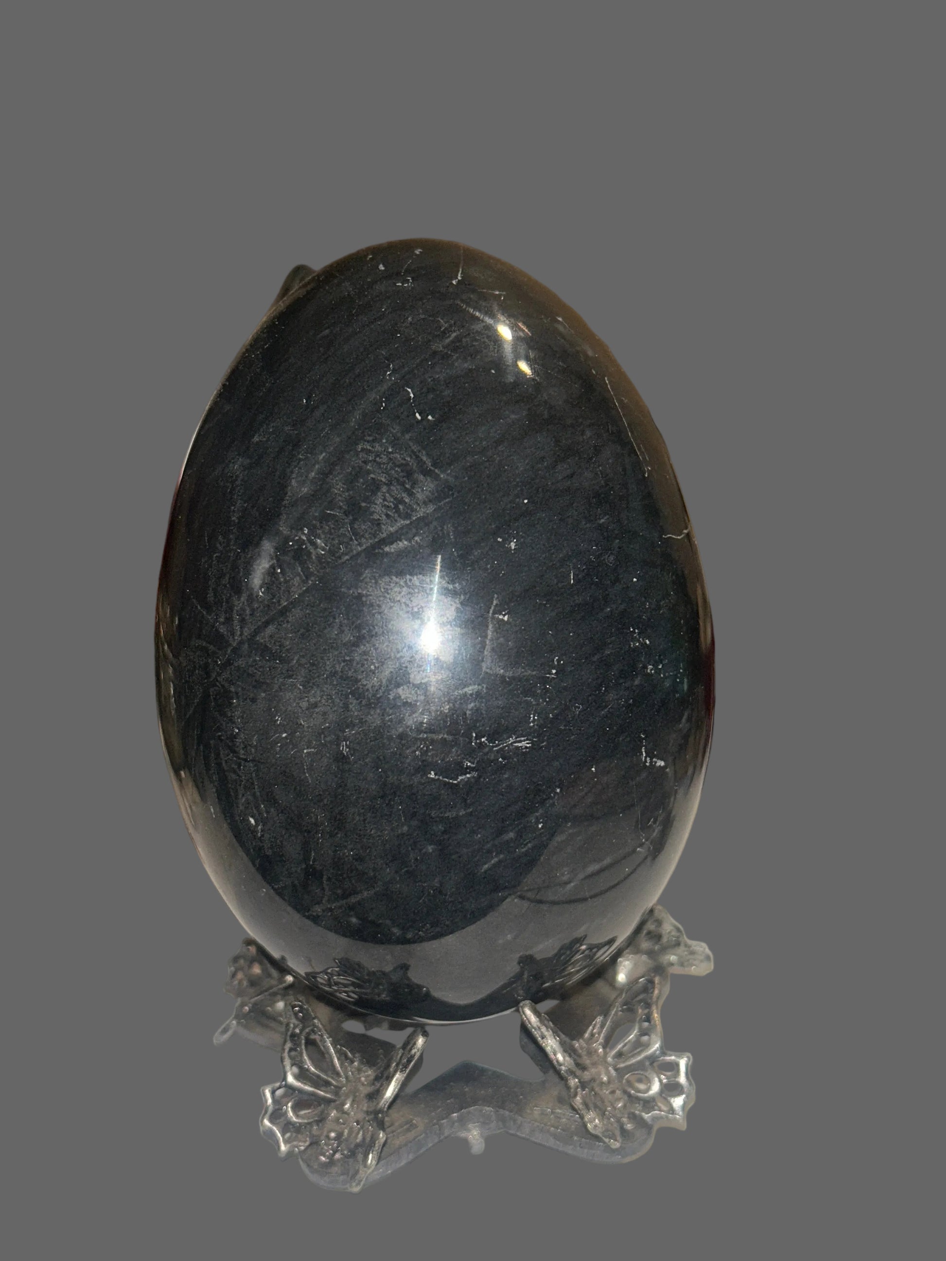 Void Mirror — Black Obsidian Egg Carving — detail view