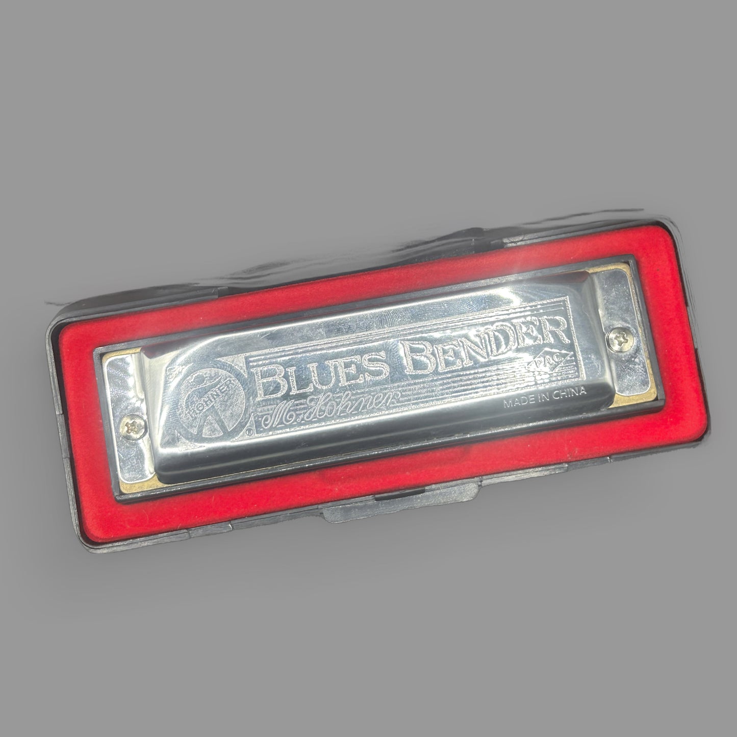 Hohner Blues Bender Harmonica — 10 Hole Diatonic Blues Harp with Red Case — detail view