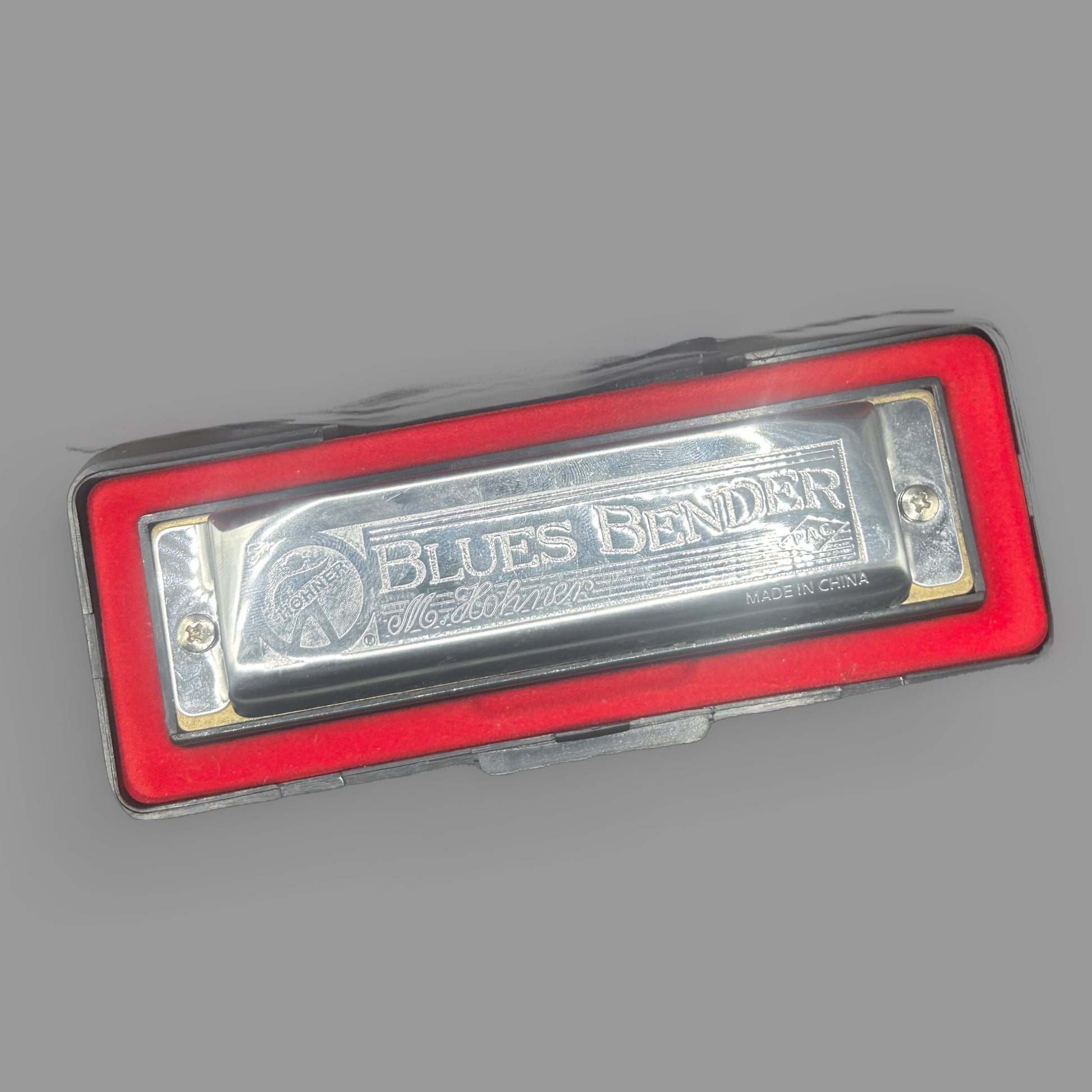 Hohner Blues Bender Harmonica — 10 Hole Diatonic Blues Harp with Red Case — detail view