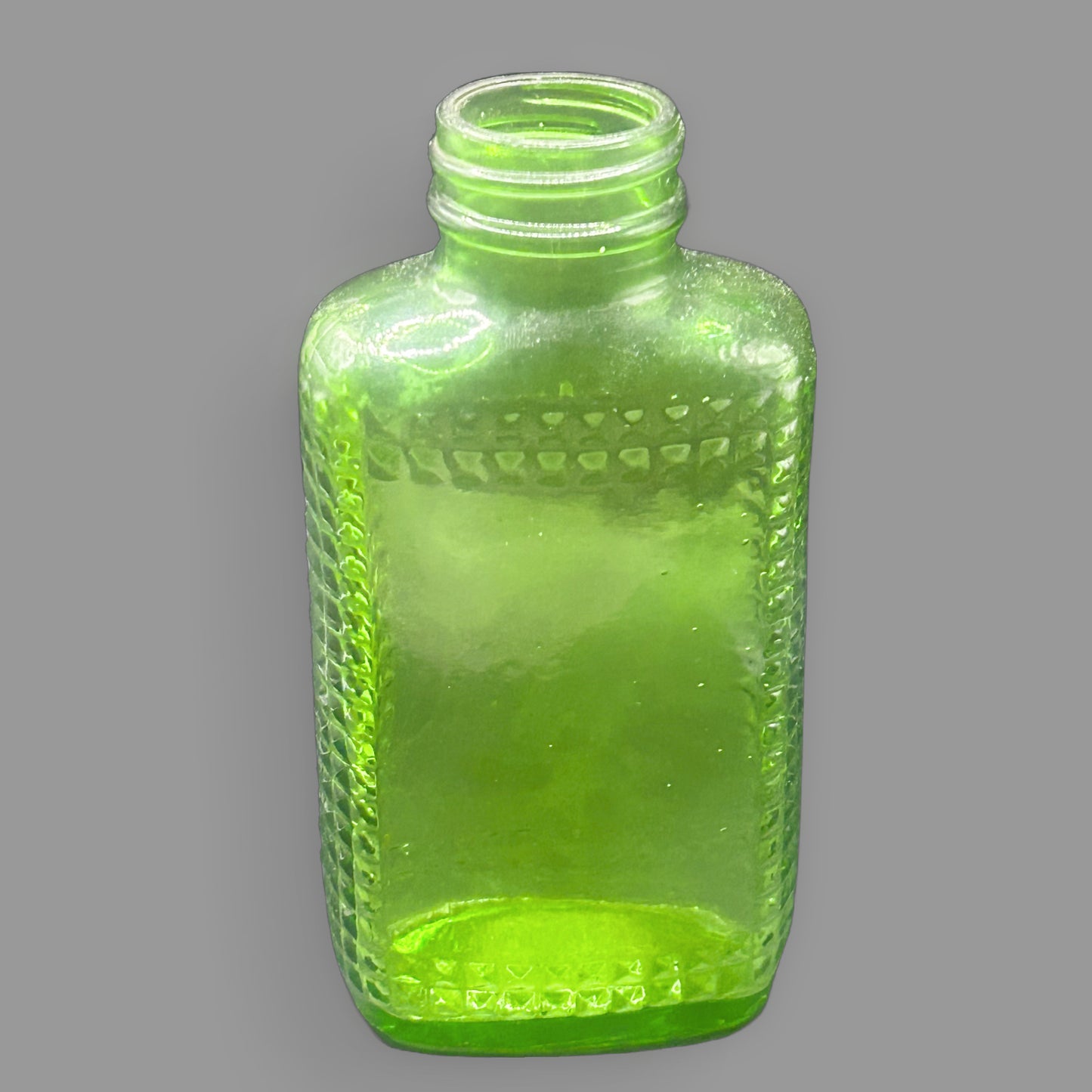 Vintage Green Glass Diamond Pattern Bottle — Decorative Glassware — detail view
