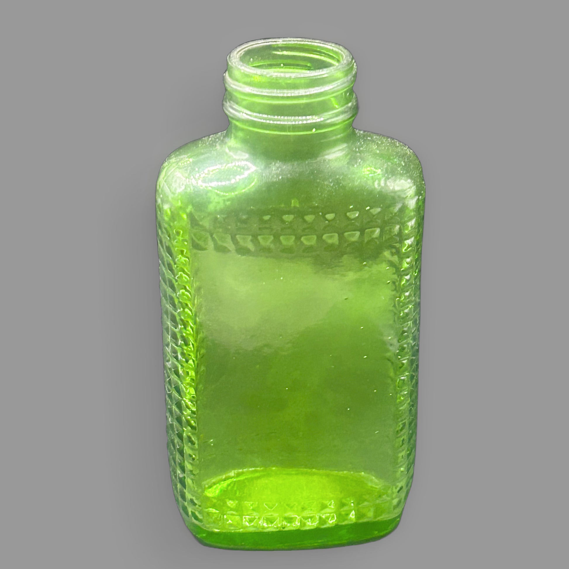 Vintage Green Glass Diamond Pattern Bottle — Decorative Glassware — detail view