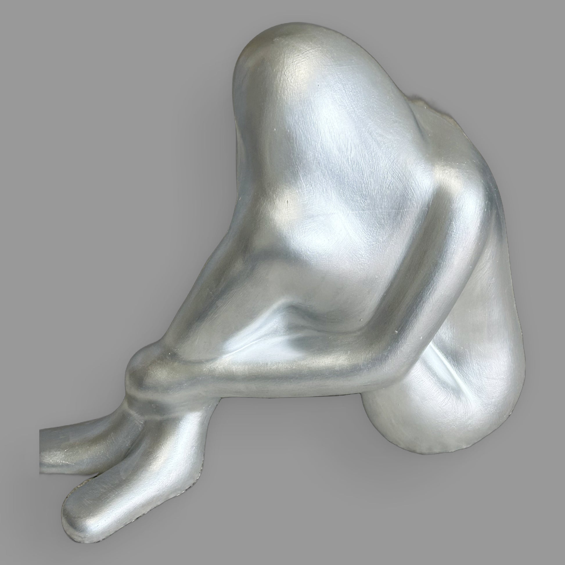 Silver Abstract Seated Figure Sculpture — detail view