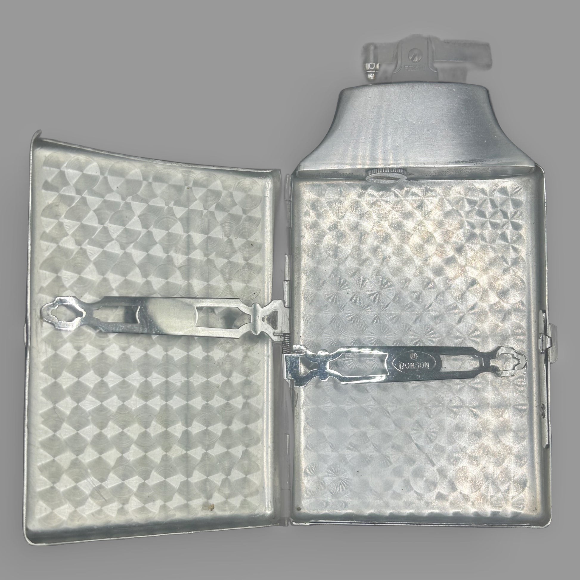 Ronson Mastercase Combination Lighter & Cigarette Case — Chrome, Engine-Turned Interior — detail view