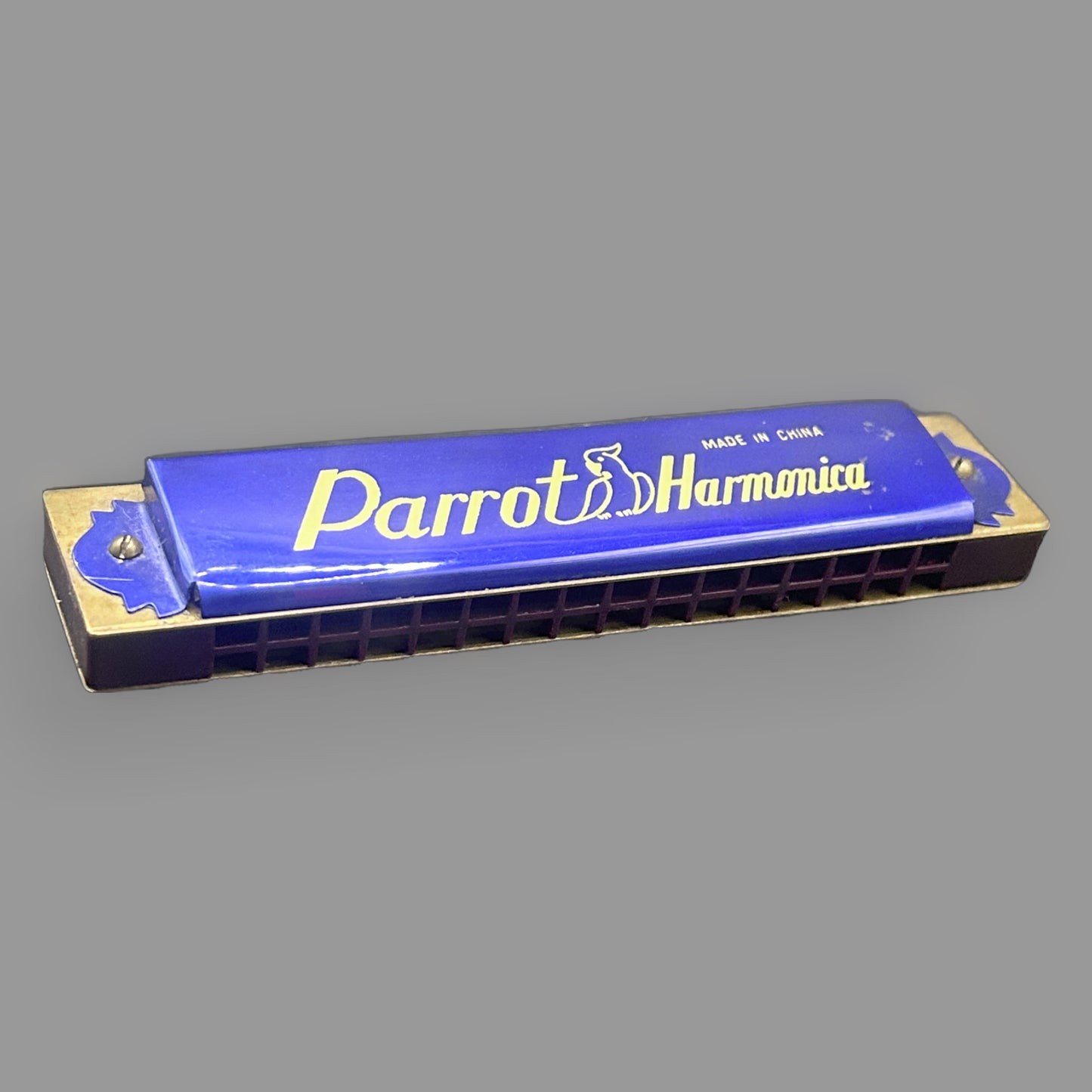 Parrot Vintage 32-Hole Harmonica — Blue with Gold Accents, Tremolo Style — detail view