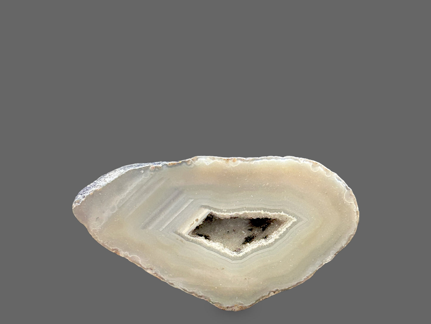 Sliced Agate Geode — Cream & Ivory Banding, Dark Druzy Center, 136g — detail view