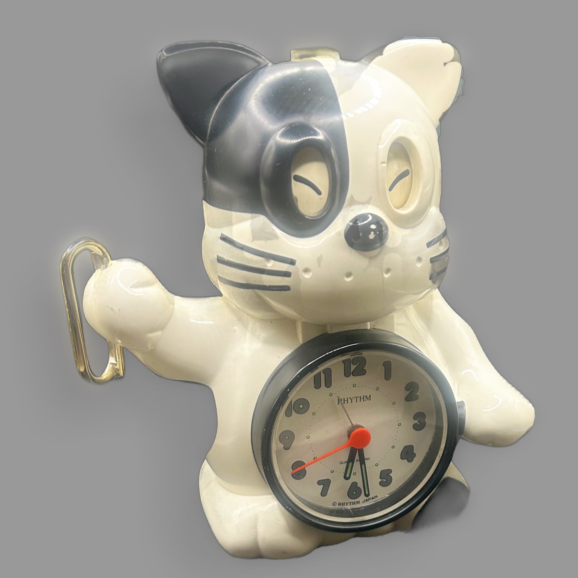 Vintage 1980s Rhythm “Rise & Shine” Black & White Cat Bugle Alarm Clock — Made in Japan — detail view