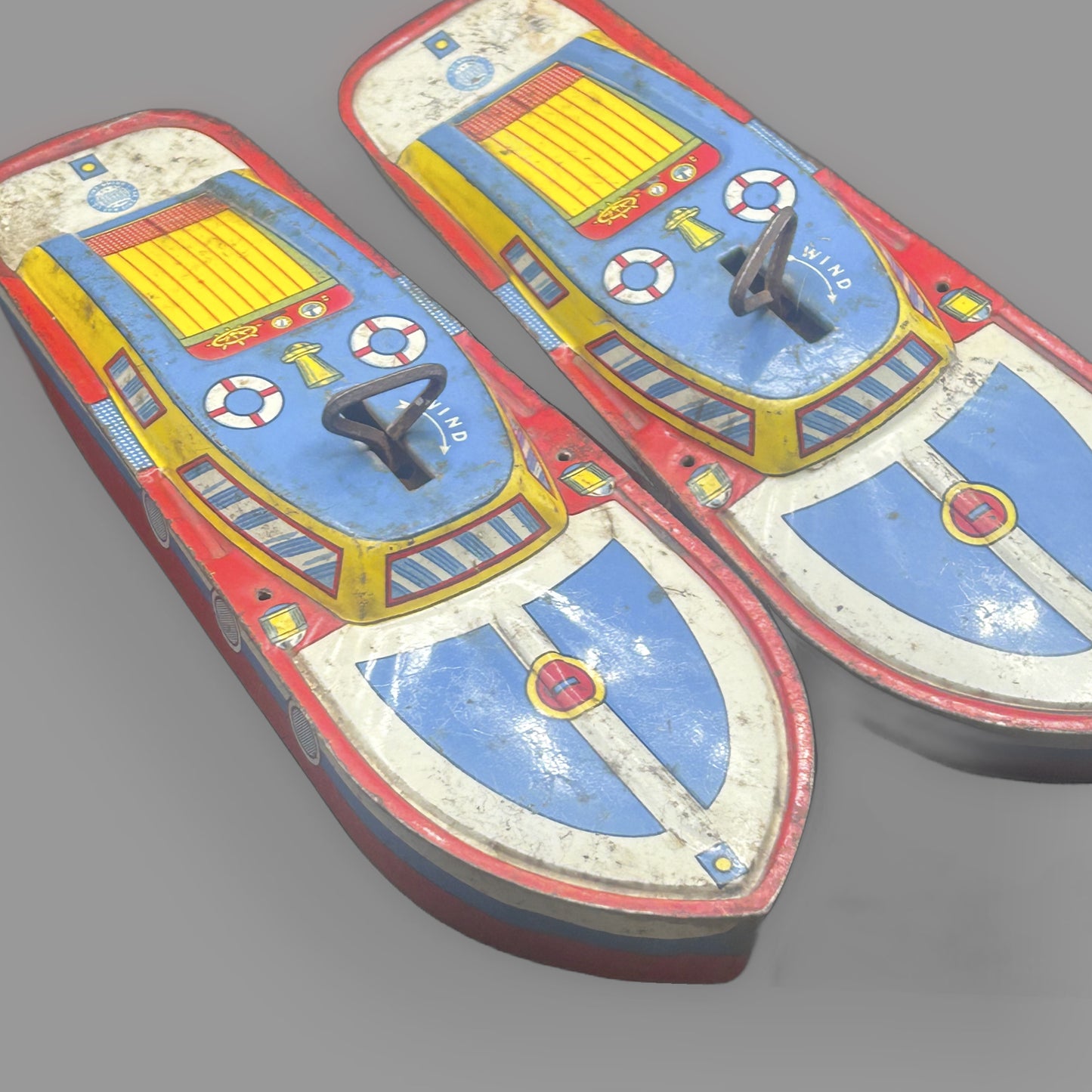 Vintage Ohio Art Tin Wind-Up Cabin Cruiser Boat Toy — 1960s Nautical — detail view