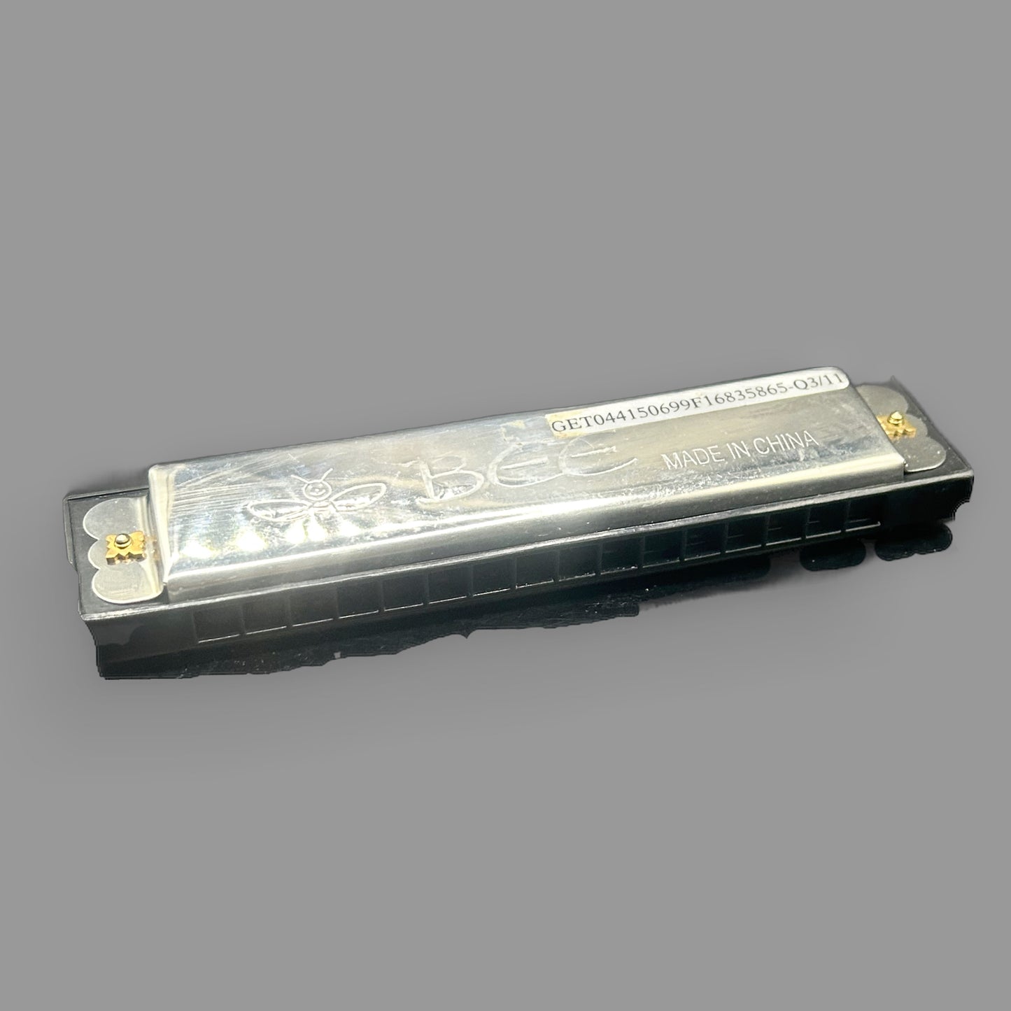 Vintage Bee Brand Harmonica — 10-Hole Folk & Blues Instrument — detail view