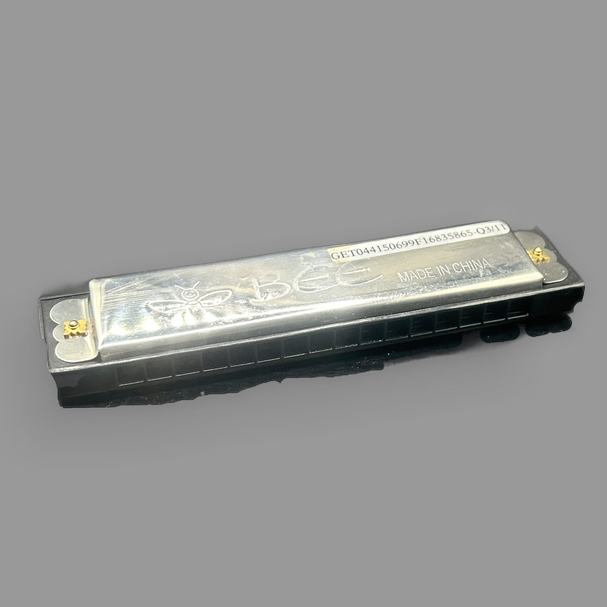 Vintage Bee Brand Harmonica — 10-Hole Folk & Blues Instrument — detail view